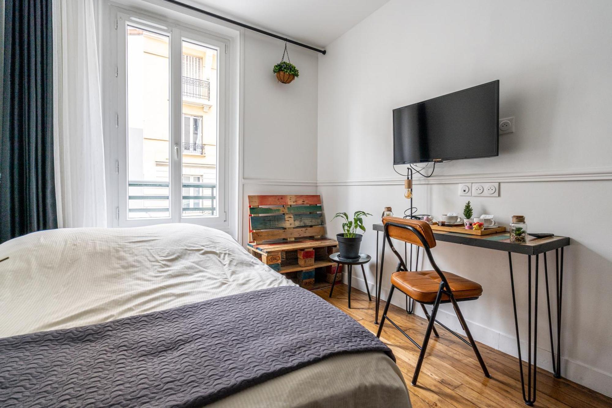 Au Marche Aux Puces De Saint Ouen Apartamento Exterior foto
