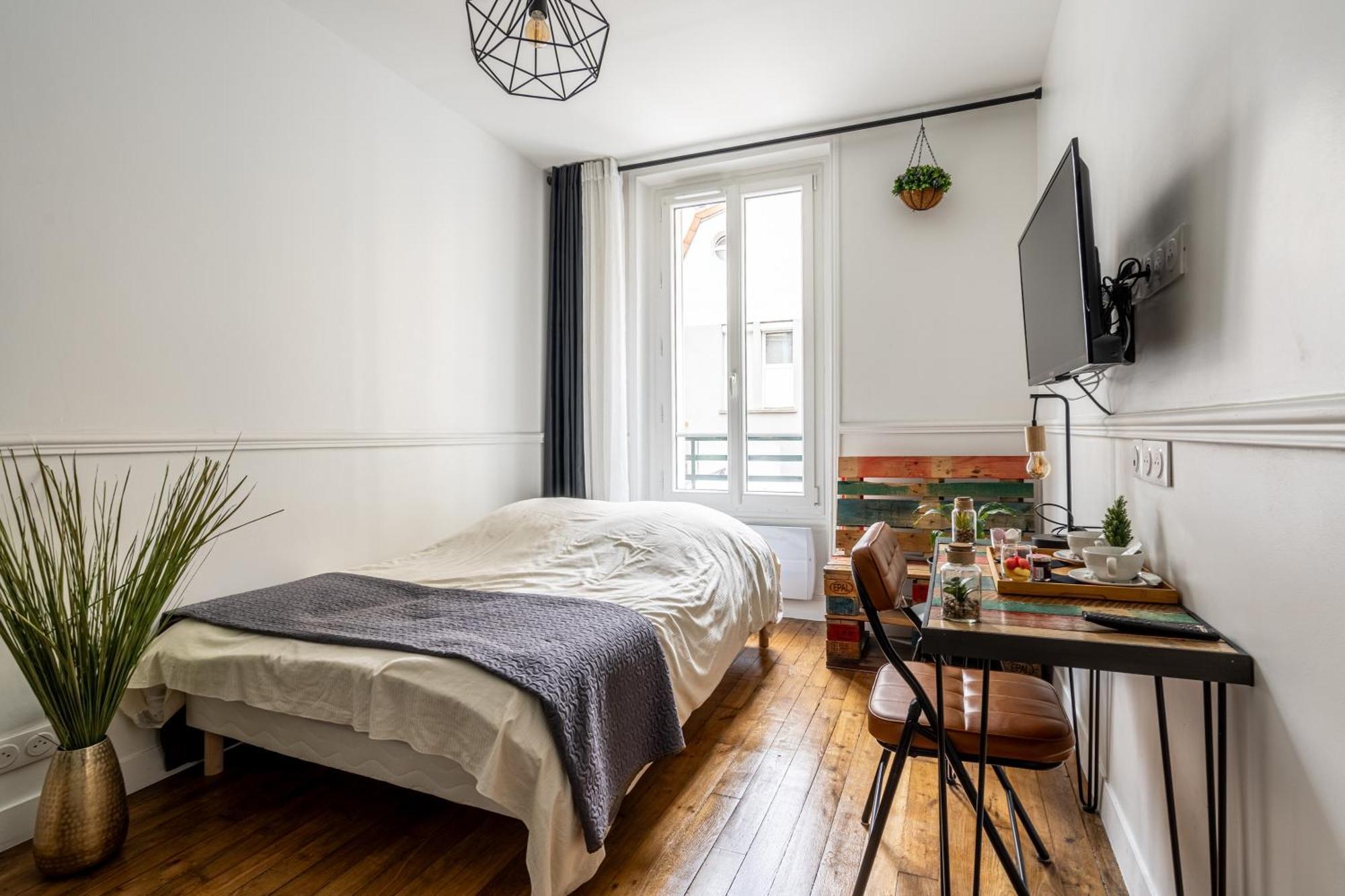Au Marche Aux Puces De Saint Ouen Apartamento Exterior foto